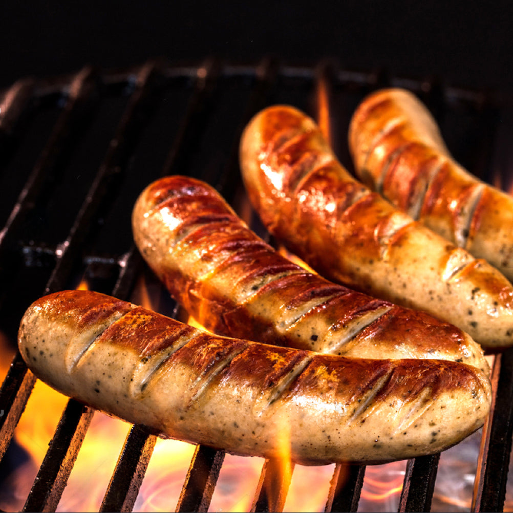 grilled sausage on the flaming grill